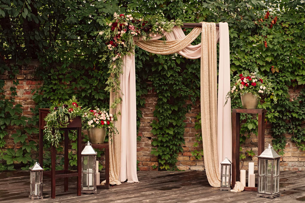 Wedding arch ideas for every wedding romantic draped wedding arch