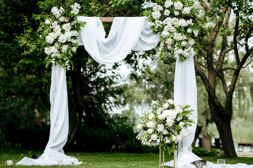 Top wedding ideas & trends for 2026 dramatic decor draped wedding arch