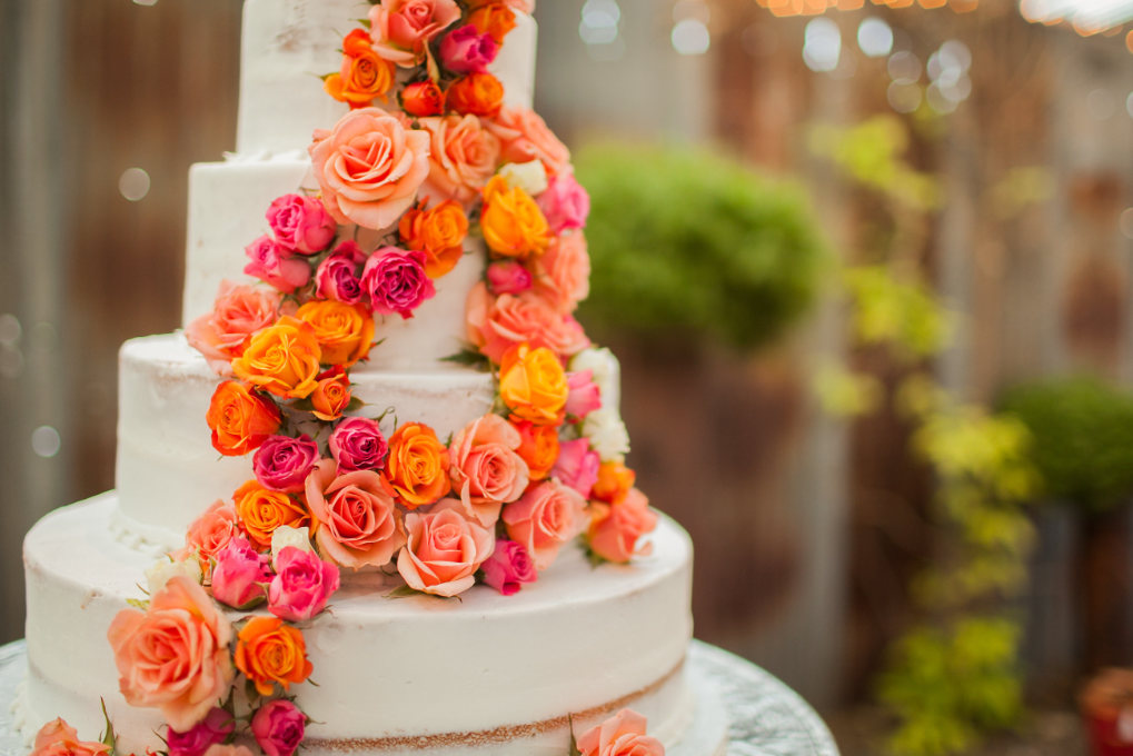 what is a fake wedding cake and do you need one pink and orange floral wedding cake
